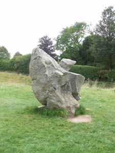 Stone at Avebury that looks like an abstract face or an uncomfortable chair with armrests