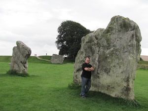 Shanon standing in front of one of the massive rocks at Avebury